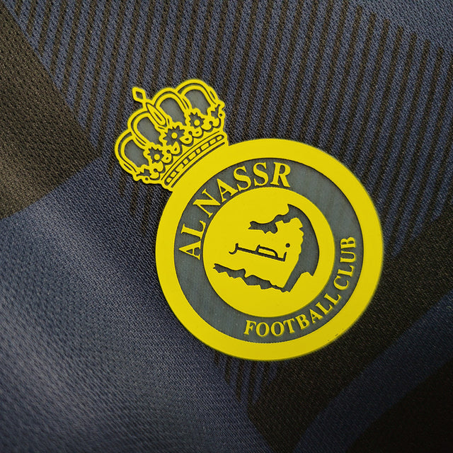 Camisa Al-Nassr Treino 23/24 - Torcedor Dunes Masculina - Azul com detalhes em preto e amarelo