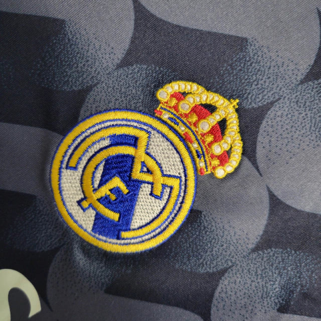 Camisa Real Madrid II 23/24 manga Longa - Torcedor Adidas Masculina - Azul com detalhes em amarelo e branco e roxo