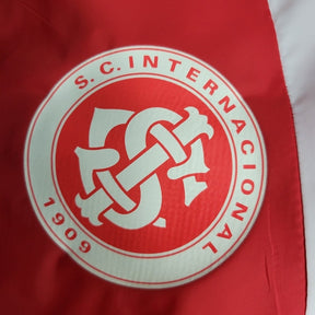 Jaqueta Corta-Vento Internacional 23/24 - Masculina Nike - Vermelha com detalhes em branco