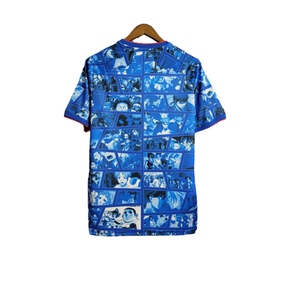 Camisa Japão Edição especial comemorativa 22/23 - Torcedor Adidas Masculina - Azul com detalhes de desenhos em quadrinhos