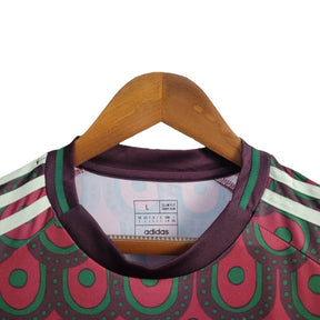 Camisa Seleção do México I 24/25 - Torcedor Adidas Feminina - Vinho com detalhes em vermelho e verde