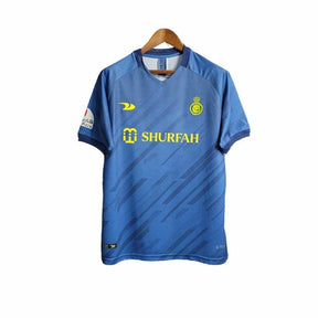 Camisa Al-Nassr II 23/24 Torcedor Dunes Masculina - Azul com detalhes em amarelo